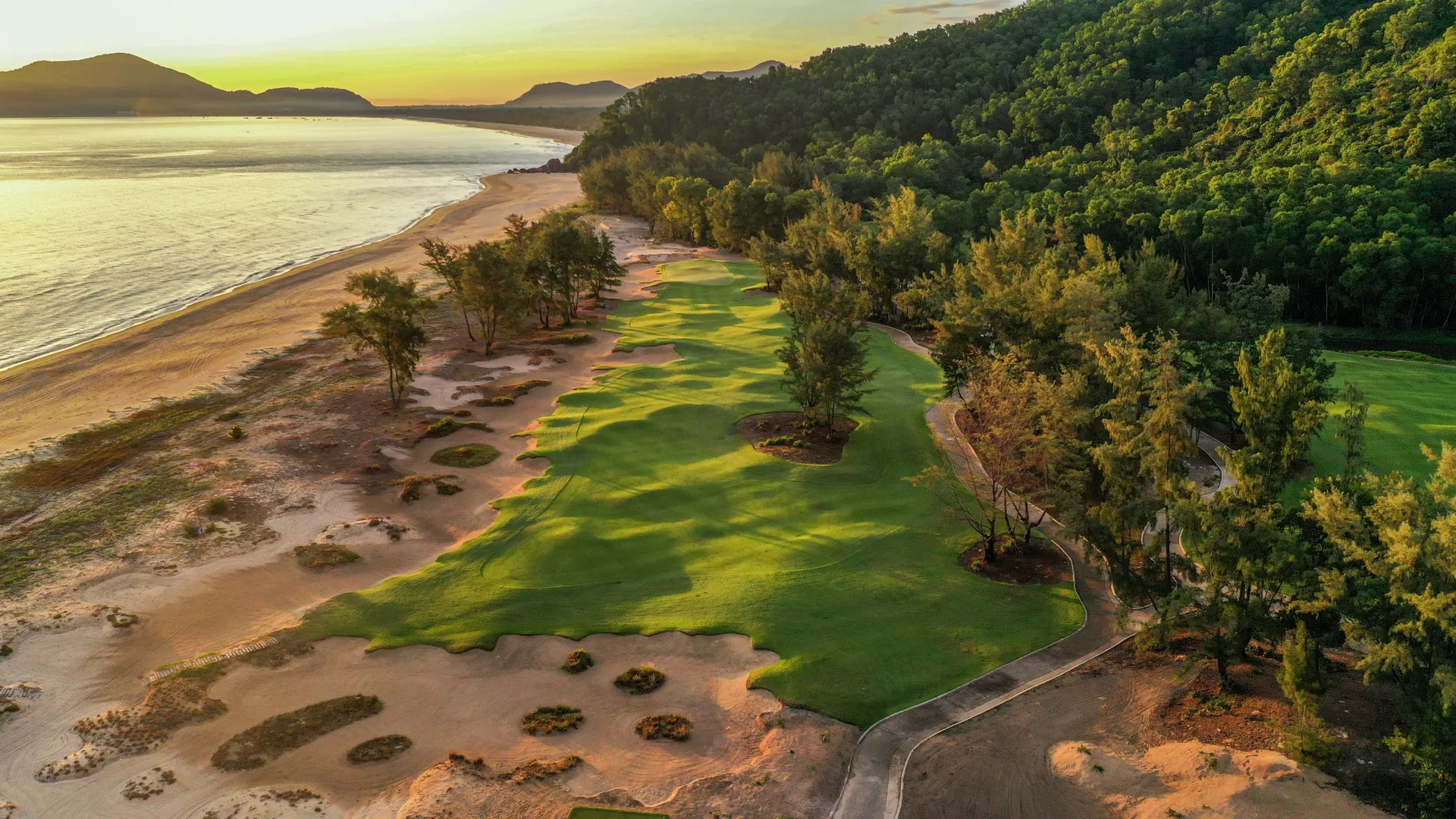 Vietnam Courses Laguna Lang Co Aerial Fairway Sunrise - Luxury Golf Tours Asia 2026